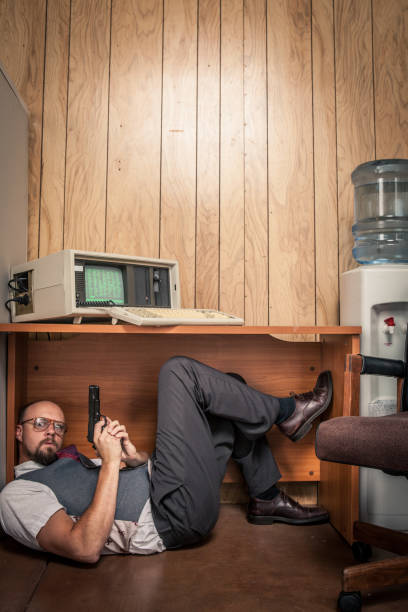 istock Paranoid gun weilding office worker 1980's computer style 157743043