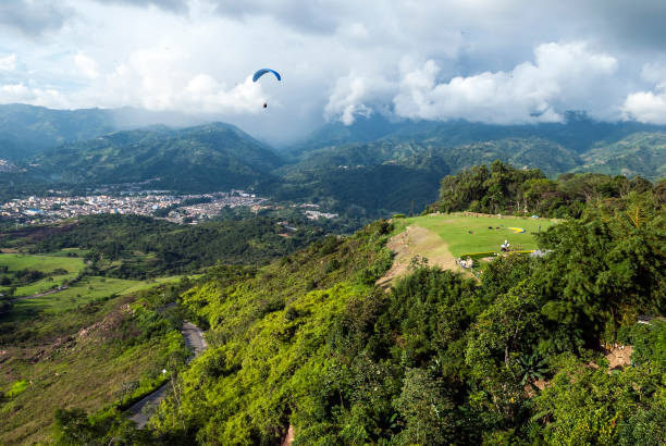 Paragliding above the beautiful mountainous landscape in Bucaramanga, Colombia