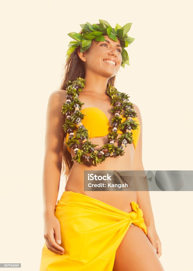 Beautiful Hula Dancer Young Hula Dancer posing for the camera wearing a lei and haku headpiece. Hawaii Islands Stock Photo