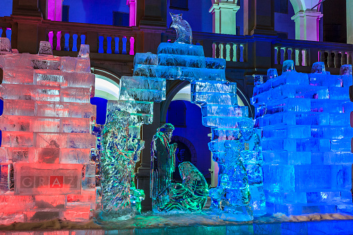 Graz, Austria - December 15, 2010: A traditional feature of Advent in Graz is the ice nativity scene in the Landhaus courtyard. It is an artwork of the ice sculptor Gert J. Hoedl and his team, who have used about 50 tons of crystal ice.
