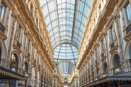 Galleria Vittorio Emanuele II, is located in the heart of Milan, and it’s situated behind the Milan Cathedral « il Duomo ». Corso Vittorio Emanuele is a veritable promenade of luxury boutiques. Its name honors Vittorio Emanuele II, the first king of a unified Italy. Milan, in Italy. July 13, 2023.