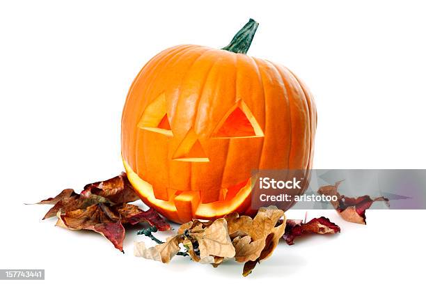 Illuminated Halloween Pumpkin On Autumn Leaves Stock Photo - Download Image Now - Autumn, Color Image, Cut Out