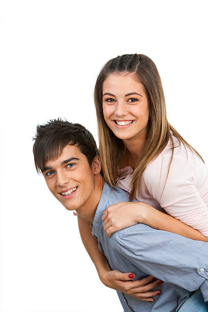 istock Cute boyfriend piggybacking his girlfriend. 157750571