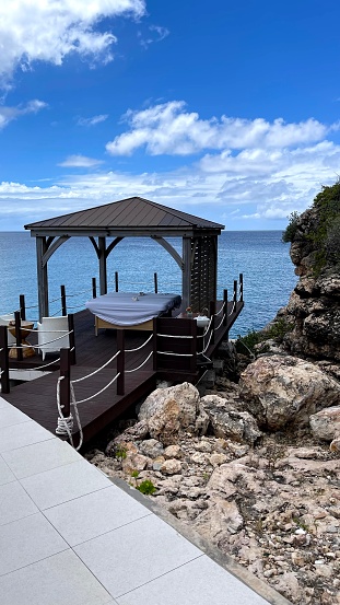 Outdoor massage tables near the beautiful waters of Sint Maarten.