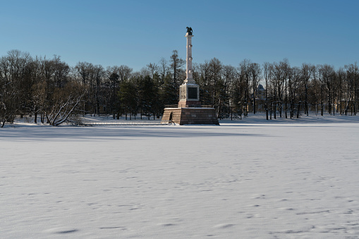 The Chesmenskaya Column in the Catherine Park in Tsarskoye Selo on a sunny winter day, Pushkin, St. Petersburg, Russia