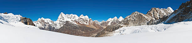 istock High altitude mountain wilderness white glaciers snow capped peaks panorama 157770302