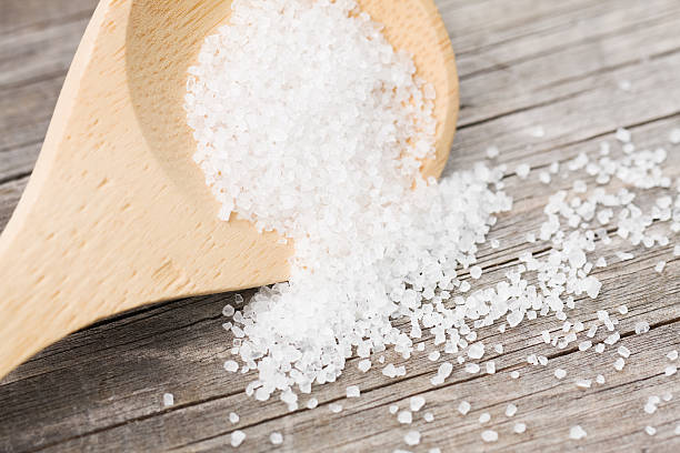 istock Sea Salt on Wooden Spoon 157770706