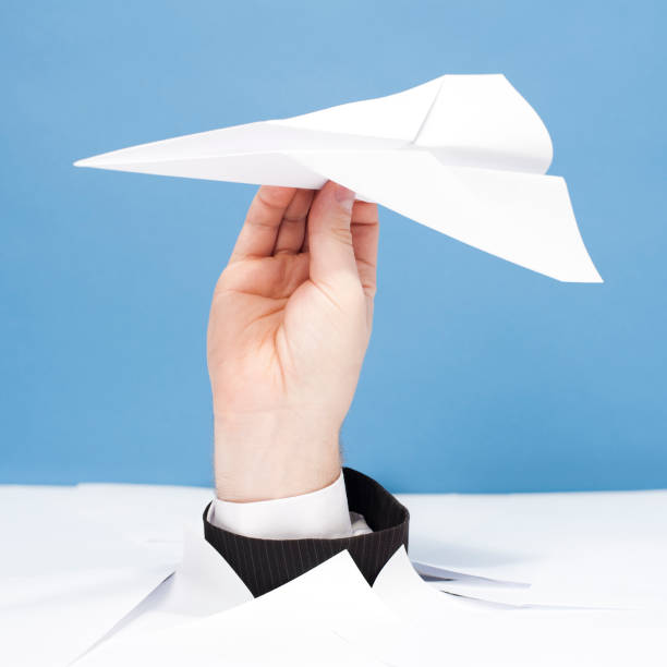 istock Businessman Buried in Paperwork 157770758