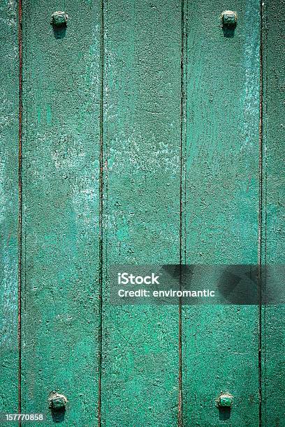 Green Grunge Wood Background With Four Framing Studs Stock Photo - Download Image Now