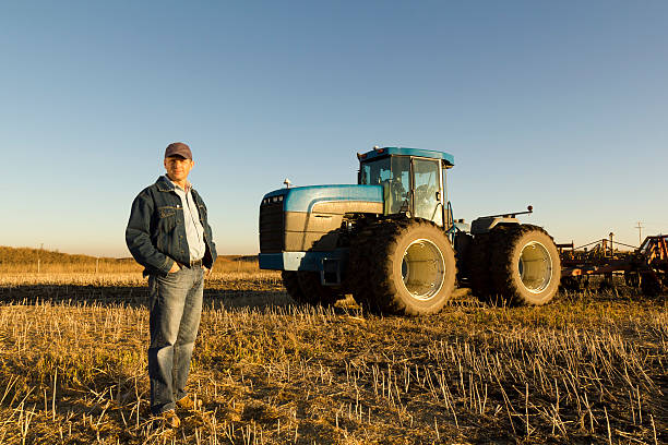 istock Farmer in a Harvested Field 157770987