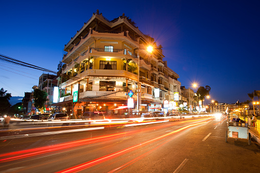 Phnom Penh, Cambodia - December 12, 2010: Light trails from long exposure shot on the main riverside street in the city.