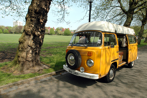Liverpool, England - April, 28 2007: Old Yellow Volkswagen Type 2 Camper Van in Sefton Park, Liverpool