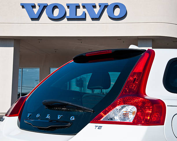 Berlin, Germany - 6th May, 2021: Volvo vehicles stopped on a public parking. The Volvo is a Swedish multinational manufacturing company headquartered in Gothenburg. Since 2010 it has been owned by the Geely Holding Group, China's multinational automotive manufacturing company.