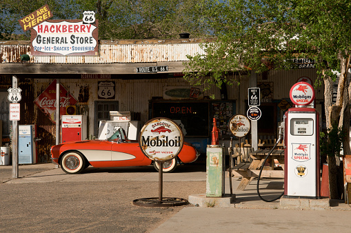 Barstow, California, United States - August 31, 2023: Route 66 pedestal  in Main Street in Barstow, which is part of the old Route 66, has several pedestals with vintage cars on top. This one represent the state of Illinois.