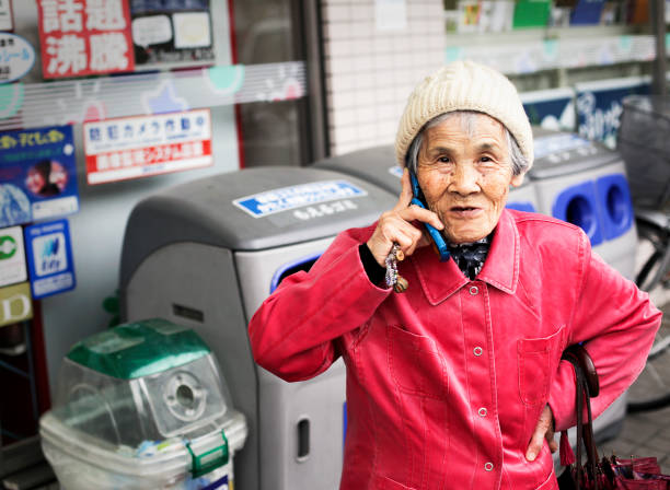 Mature woman, consultant and headset with mic for online communication or customer service in home. Closeup, mouth or agent with smile for remote work, network advice or telecommunications in house