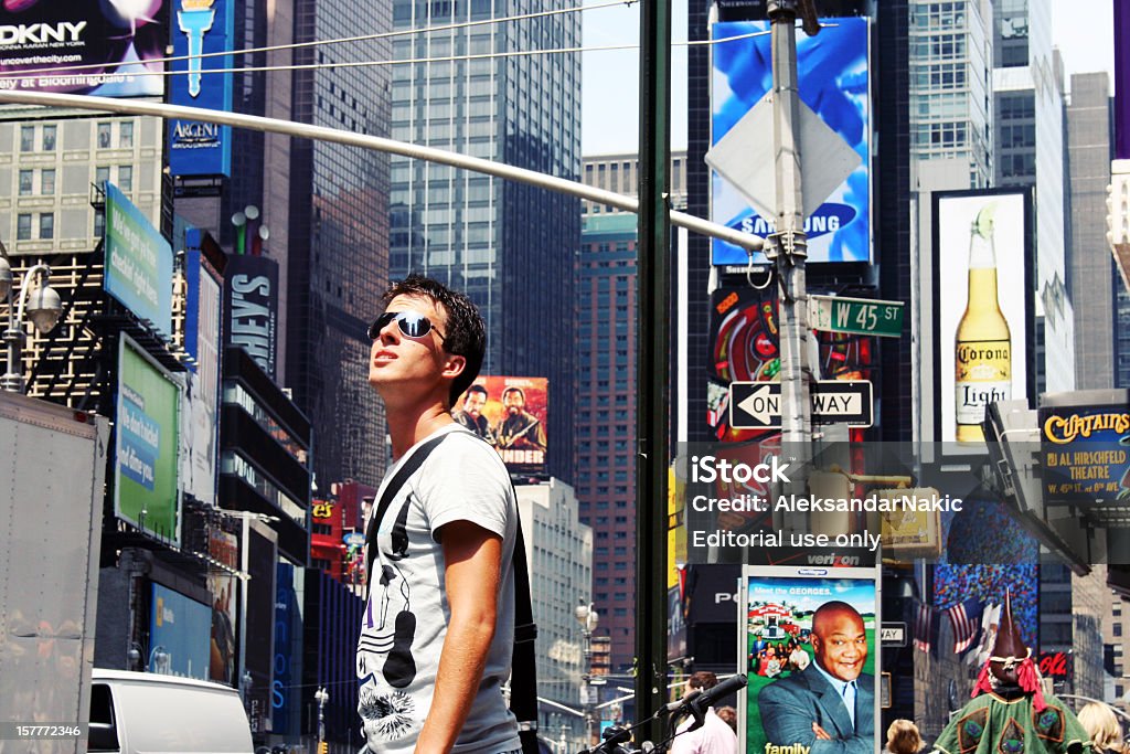 Times Square and a tourist  Times Square - Manhattan Stock Photo