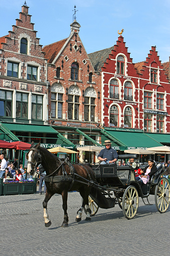 Bruges, Belgium. 16 July 2022. Horse and carriage rides in Bruges