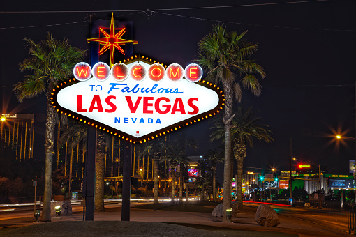 Las Vegas, United States - November 23, 2022: A picture of the Venetian Las Vegas at night, with the Rialto Bridge and the Campanile Tower on the left, Saint Mark and Saint Theodore columns on the right, and the Mirage on the far right.