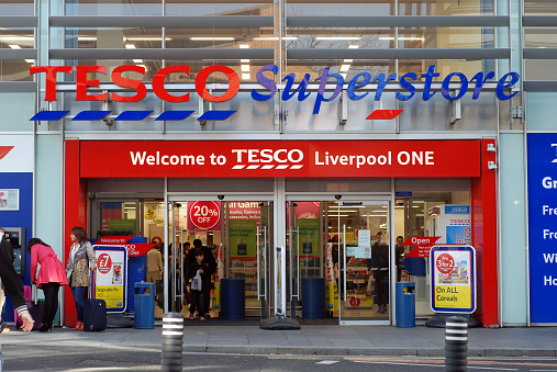 Liverpool, England - February 26, 2011: Tesco superstore supermarket in Liverpool One shopping mall. Tesco plc is a global grocery and general merchandising retailer headquartered in Cheshunt, United Kingdom.