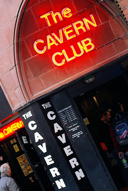 The Cavern club in Liverpool Mathew Street. Liverpool, England - February 26, 2011: The Cavern club in Liverpool Mathew Street. The Cavern Club is a rock and roll club in Liverpool, England. Opened on Wednesday 16 January 1957, the club is where The Beatles had their first performance on 9 February 1961. beatles stock pictures, royalty-free photos & images