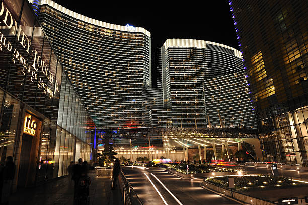 Las Vegas, USA - December 27, 2011 : A view at the corner of the Strip (Las Vegas Boulevard) and Harmon Avenue where Crystal's retail and entertainment Center is situated.