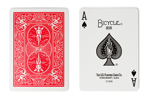 Four aces playing cards on grey background. Poker play in casino. Gambling concept
