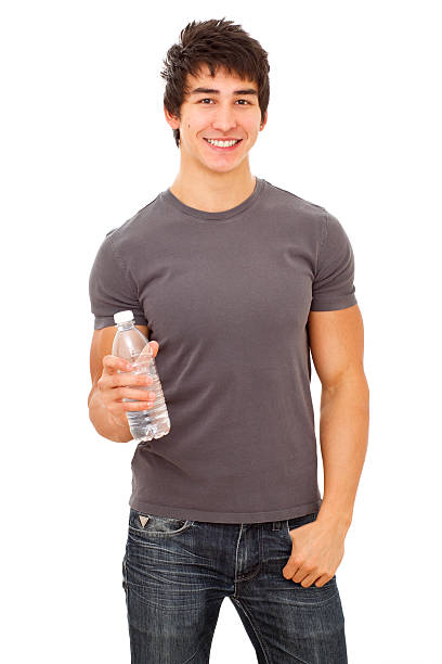 istock Smiling muscular sportive man with water bottle. 157772595