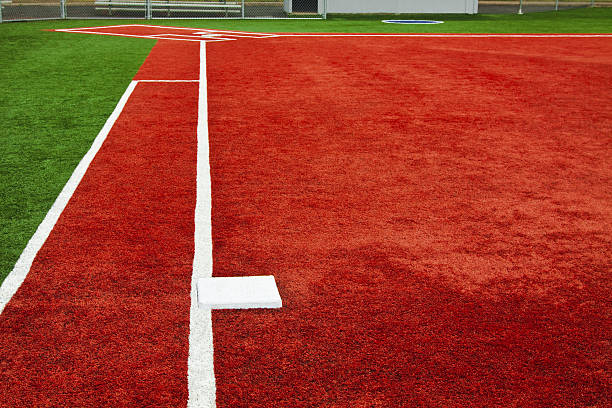 Joueur de Baseball-Première Base en direction de la Home Base - Photo