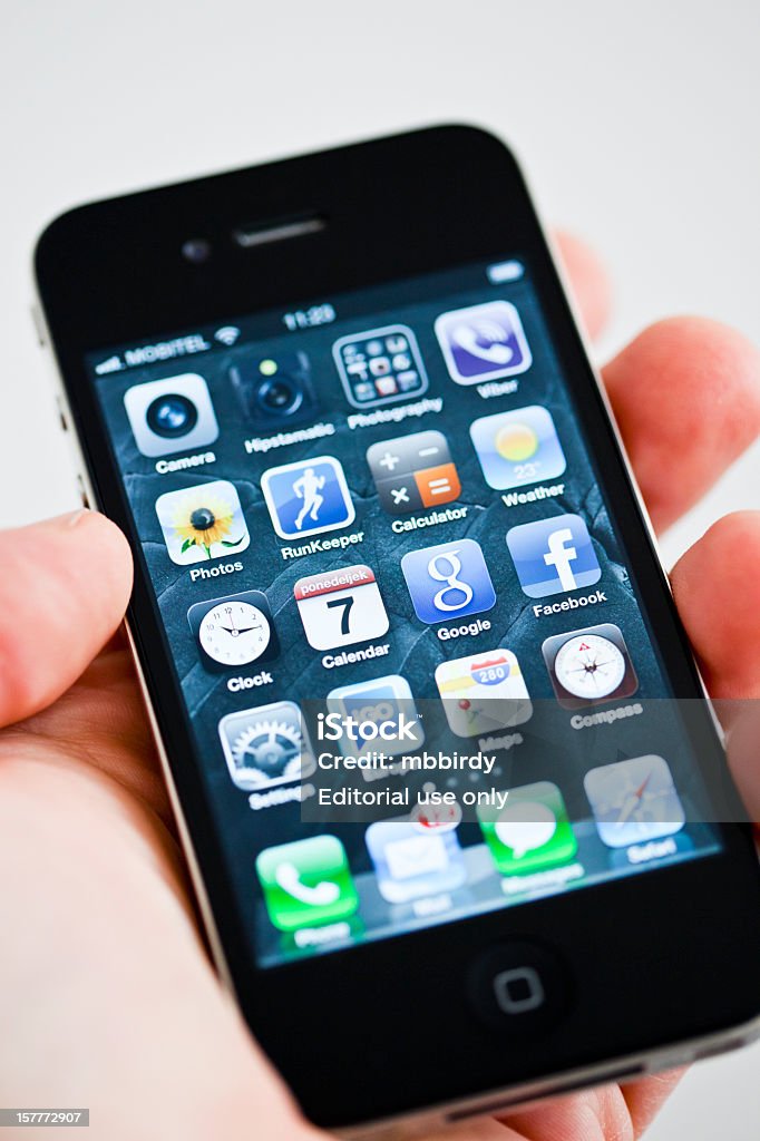 Apple iPhone 4 na Mão Humana - Royalty-free Dispositivo de informação portátil Foto de stock