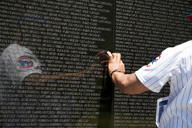 Section of the Vietnam Veterans Memorial with a flag