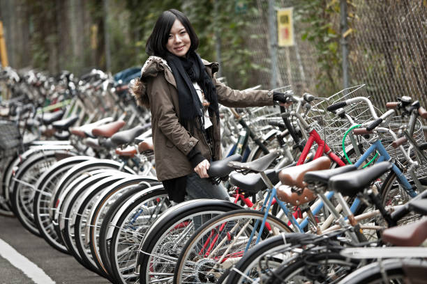 Young japanese girl at bicycle park on the street in Tokyo,Japan