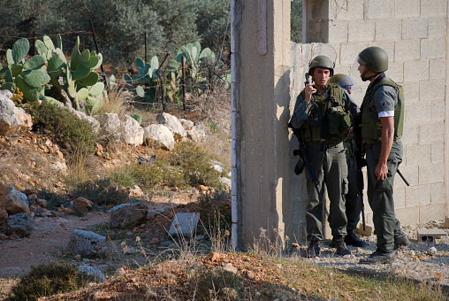 Israeli border police during clash with Palestinians in West Bank village of Bil'in in late 2006