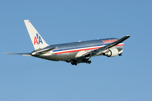 Charlotte, North Carolina, USA - December 31, 2015: An American Airlines Airbus A319, in the Piedmont Heritage livery, taxiies to the runaway at Charlotte Douglas International Airport.