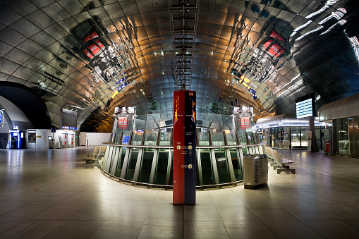 Passenger walk on a platform after a commuter train arrived  at Munich Central Station in Germany on July 25, 2022.