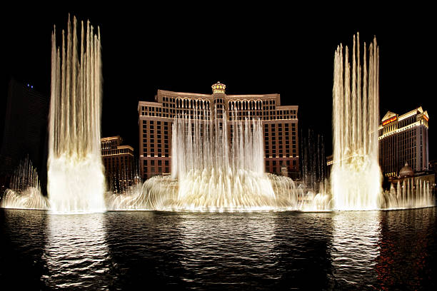 Las Vegas Las Vegas, USA - October 6, 2009: Bellagio fountains, here captured with multiple long exposures.are one of the landmarks of Las Vegas, located on the famous Las Vegas Strip where many of the largest hotel, casino and resort properties in the world are located. Nineteen of the world's 25 largest hotels by room count are on the Strip, with a total of over 67,000 rooms. bellagio stock pictures, royalty-free photos & images
