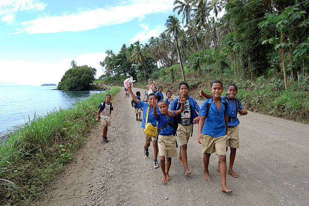 fiji meninos de escola - melanesia - fotografias e filmes do acervo