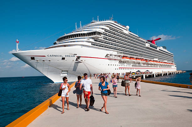Cruise excursion in Cozumel Cozumel, Mexico - March 21, 2011: Passengers disembark from the Carnival Dream during a port stop on 7-day Western Caribbean cruise cozumel photos stock pictures, royalty-free photos & images
