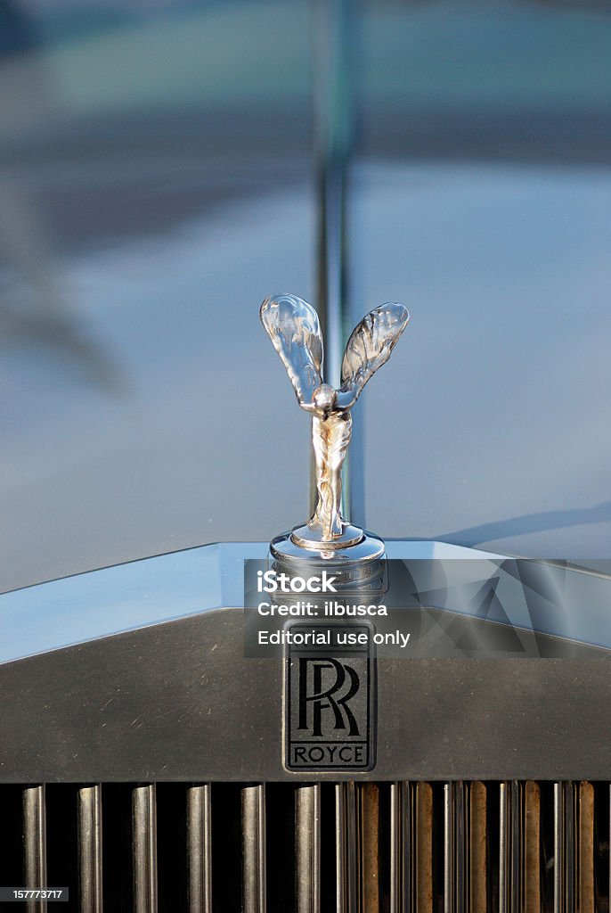 Spirit of Ecstasy hood ornament on Rolls Royce wedding car Liverpool, England - January 18, 2009: The Spirit of Ecstasy hood ornament on a Rolls Royce wedding car Model 25/30 parked in the street of Liverpool, The Spirit of Ecstasy was designed by Charles Robinson Sykes. Rolls Royce Stock Photo