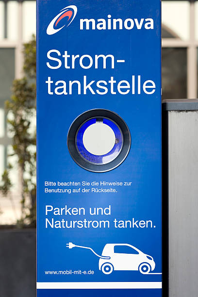 Street sign on a lamp post depicting a air pump station for bicycles, strollers and other equipment nearby