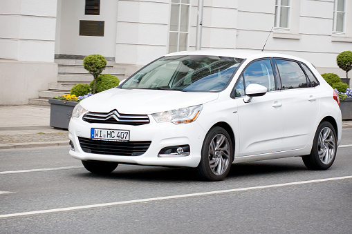 Houston, TX USA - June 28, 2023 - A A Hyundia Sonata Hybrid sedan cruising on Allen Parkway in Houston