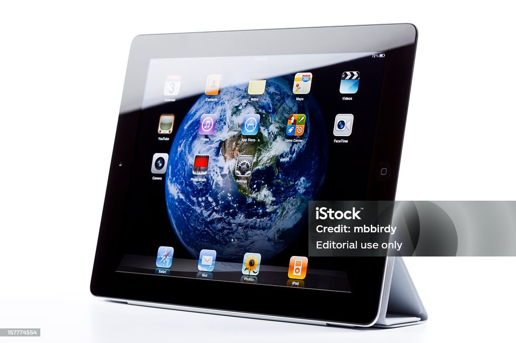 Apple est sur iPad2, isolé, avec une élégante couverture - Photo de .com libre de droits