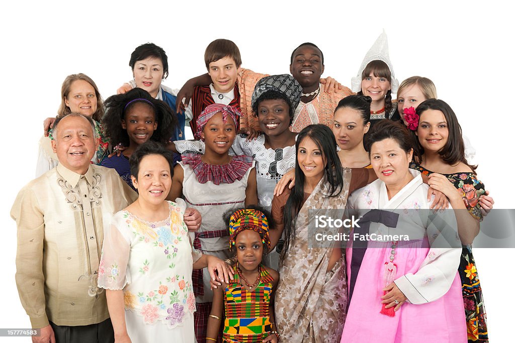 Ethnic Clothing A large diverse group of people wearing traditional ethnic clothing. Korean, East Indian, Kenyan Filipino, Spanish, Jamaican, Dutch, Finnish, German, and more Variation Stock Photo