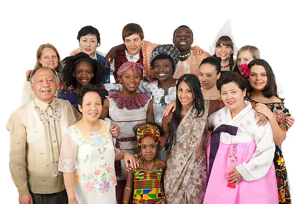 A large diverse group of people wearing traditional ethnic clothing. Korean, East Indian, Kenyan Filipino, Spanish, Jamaican, Dutch, Finnish, German, and more