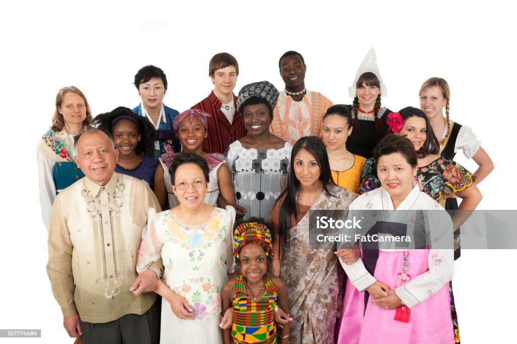 Ethnic Clothing A large diverse group of people wearing traditional ethnic clothing. Korean, East Indian, Kenyan Filipino, Spanish, Jamaican, Dutch, Finnish, German, and more Senior Adult Stock Photo