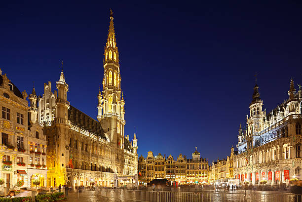 Mont des Arts on Cloudy Evening. Garden and Spire of Town Hall. City of Brussels, Belgium