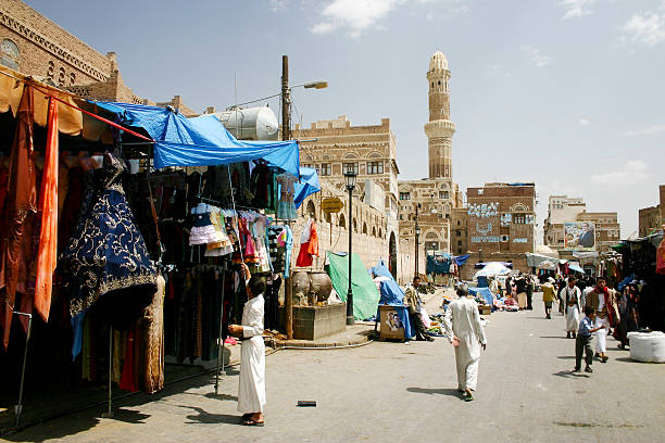 Small busy square in Old Sana'a stock photo