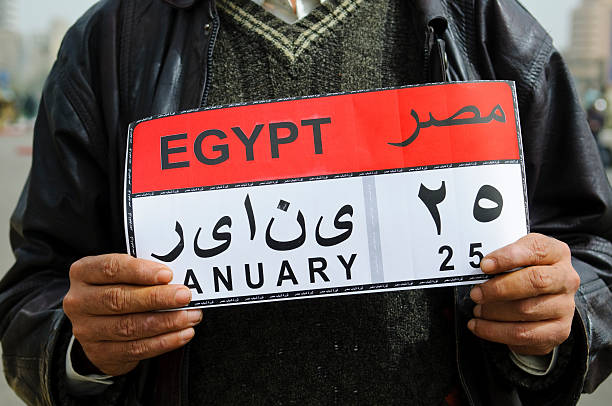 25 stycznia-egipski obrót naklejki - egypt revolution protest egyptian culture zdjęcia i obrazy z banku zdjęć