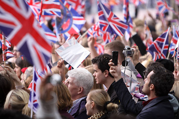 London, United Kingdom - June, 13th 2009: British troops and musicians in traditional military uniforms parade through London to Buckingham Palace