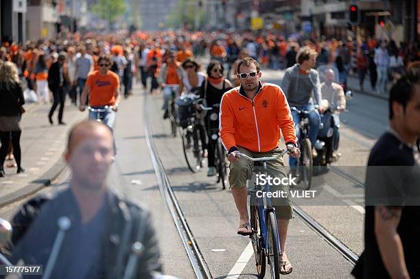 Large Crowd Of People In Amsterdam On Queens Day Stock Photo - Download Image Now - King's Day - Netherlands, Bicycle, Cycling