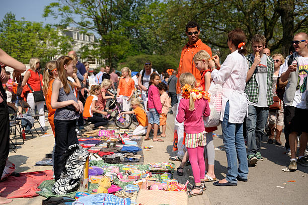 flohmarkt für kinder im vondelpark auf queen's day - people togetherness group of people editorial stock-fotos und bilder